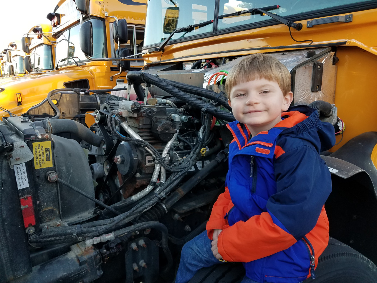 Peter wanted to check the engine in the school bus